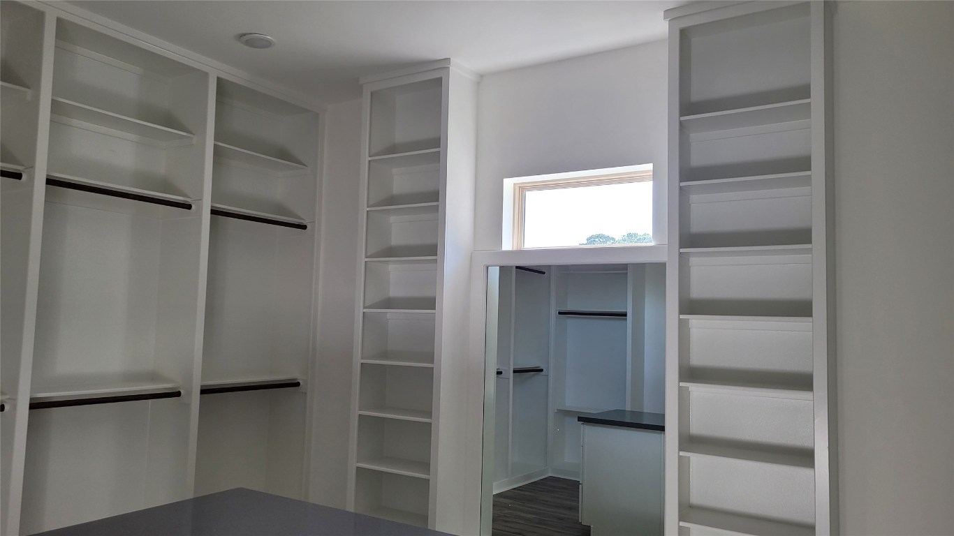 9729 Neuens Road Houston, TX 77080 - Photo 28 of 34 a view of an empty walk in closet