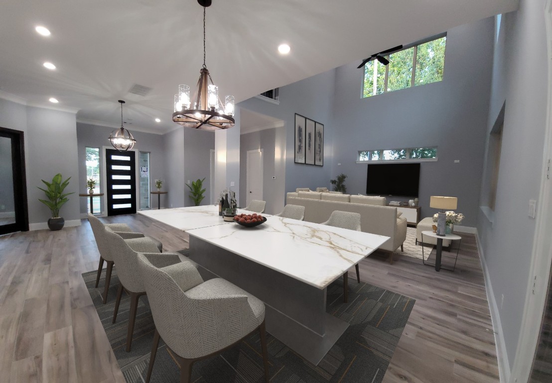 9729 Neuens Road Houston, TX 77080 - Photo 8 of 34 a large kitchen with a table and chairs