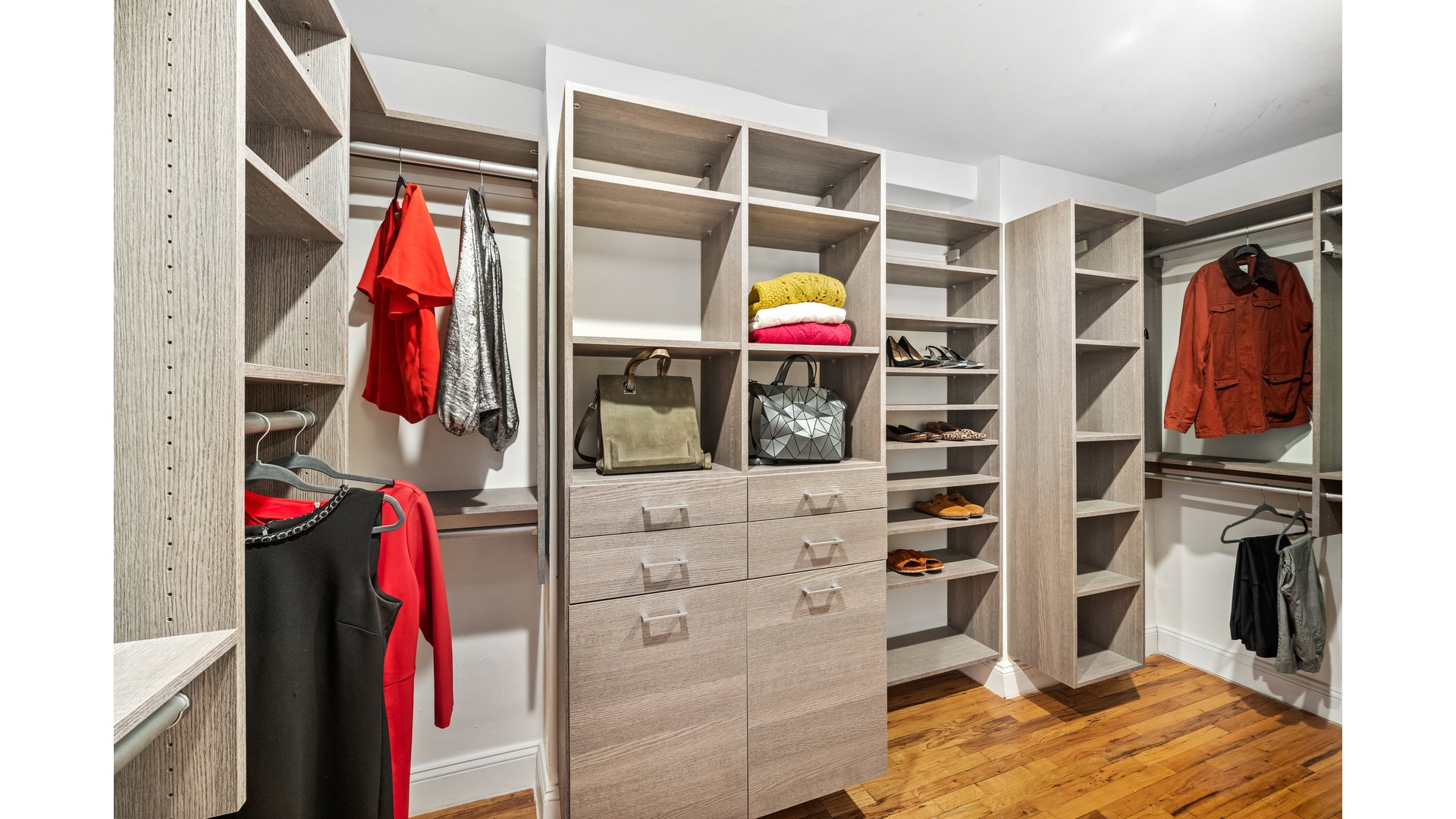 415 Argyle Road, Unit 2/3L Brooklyn, NY 11218 - Photo 14 of 23 a view of walk in closet with clothes and shoes