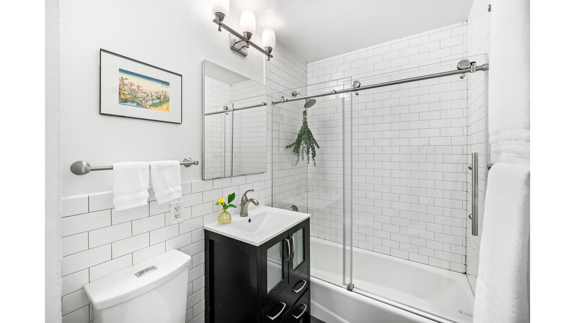 415 Argyle Road, Unit 2/3L Brooklyn, NY 11218 - Photo 17 of 23 a bathroom with a shower sink and mirror