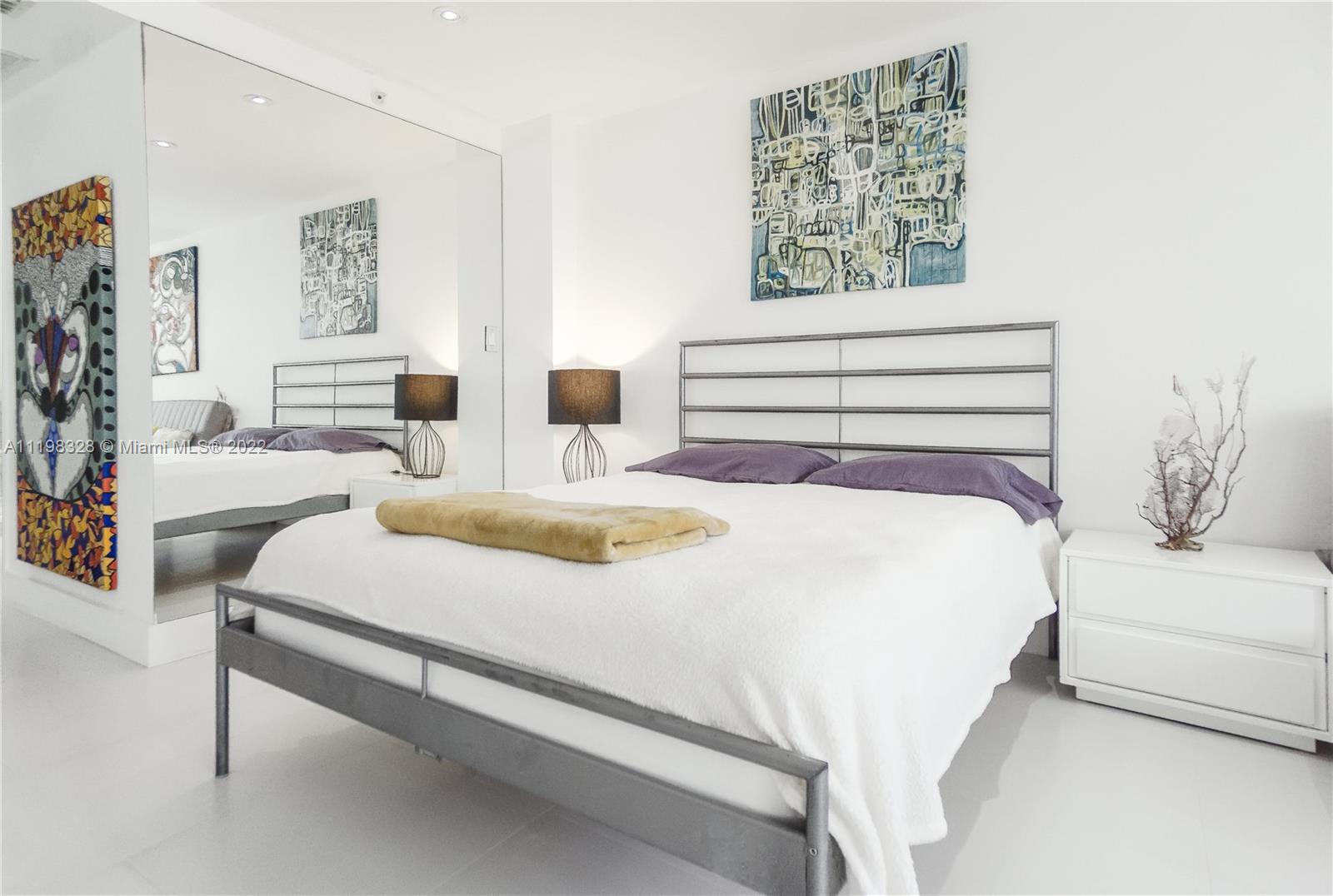 100 Lincoln Road, Unit 646 Miami Beach, FL 33139 - Photo 10 of 21 a bedroom with bed and window