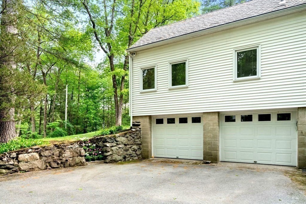 32 Whitman Road Harvard, MA 01451 - Photo 28 of 38 a view of a house with a garage