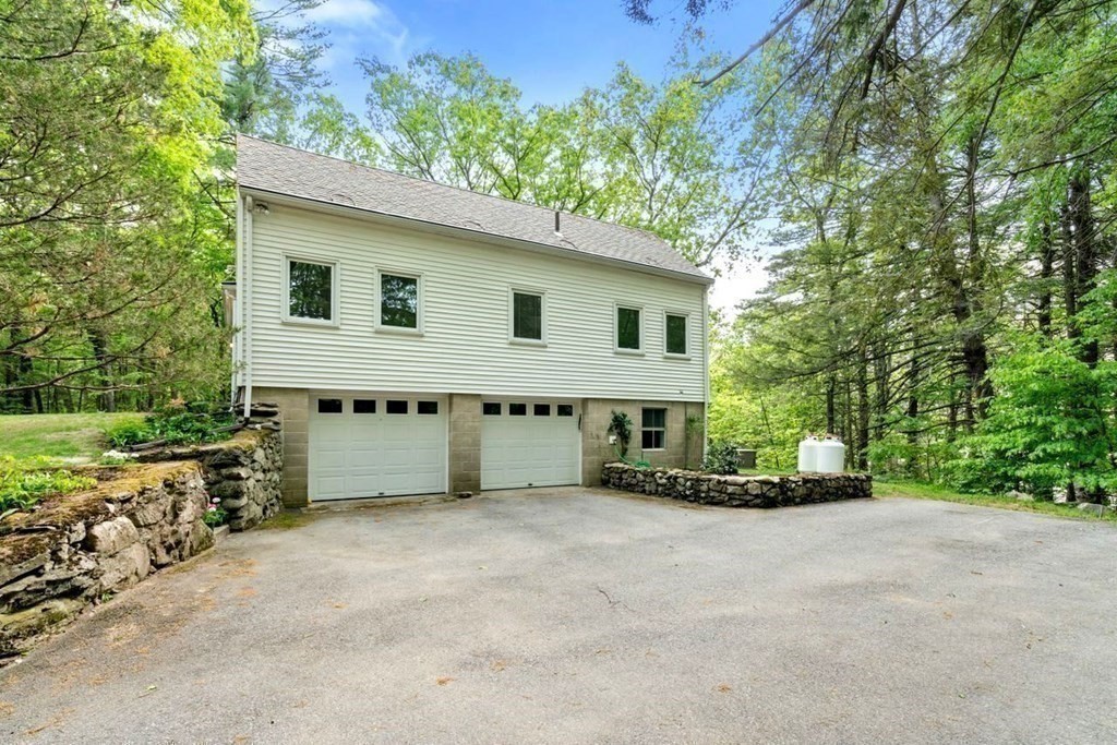 32 Whitman Road Harvard, MA 01451 - Photo 32 of 38 a house view with a outdoor space