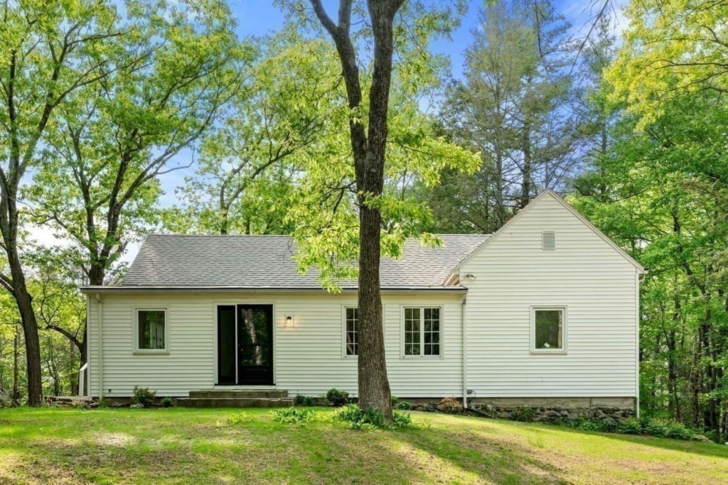 32 Whitman Road Harvard, MA 01451 - Photo 34 of 38 front view of house with a yard