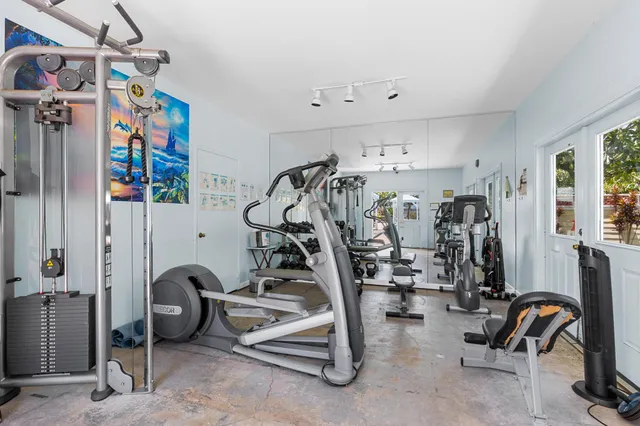 a view of a room with gym equipment