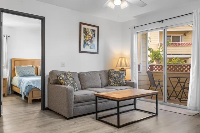 a living room with furniture and a window