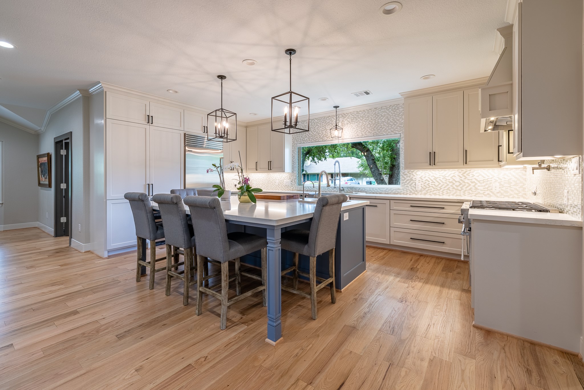 5230 Redstart Street Houston, TX 77035 - Photo 12 of 30 Kitchen wide angle showcasing the generous layout, large island, and abundant cabinet storage