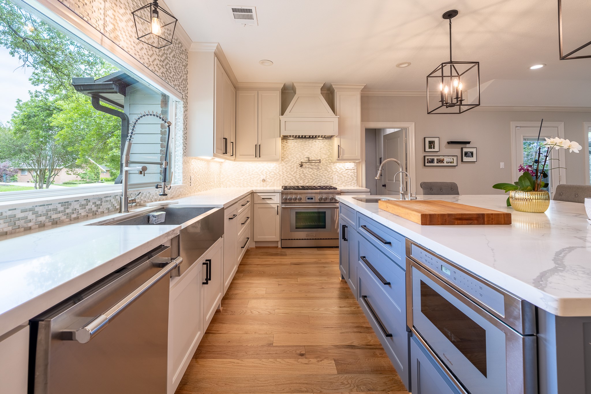 5230 Redstart Street Houston, TX 77035 - Photo 13 of 30 Kitchen with designer lighting and high-end finishes — perfect for the home chef