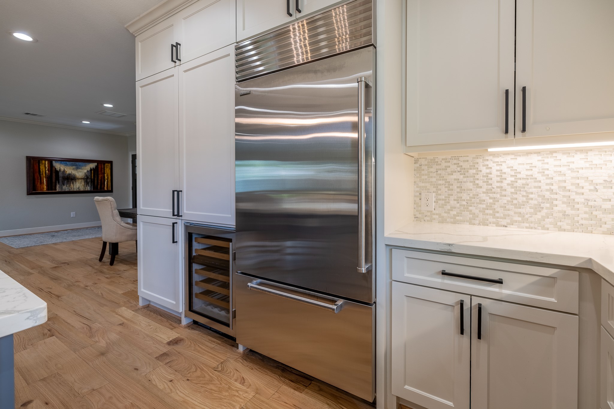 5230 Redstart Street Houston, TX 77035 - Photo 16 of 30 36" Sub-Zero refrigerator seamlessly integrated into custom cabinetry