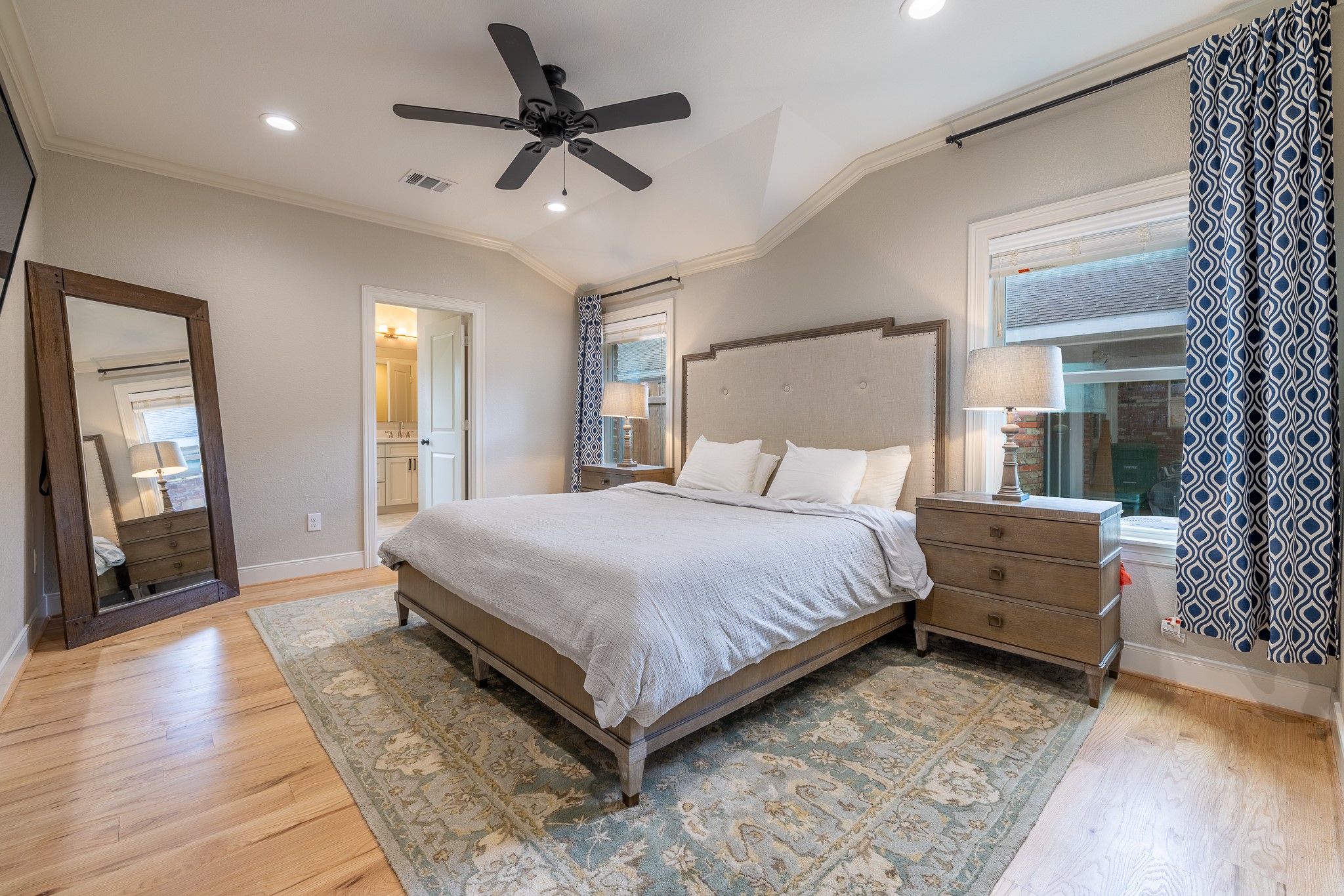 5230 Redstart Street Houston, TX 77035 - Photo 18 of 30 Serene primary bedroom retreat with hardwood floors and abundant natural light