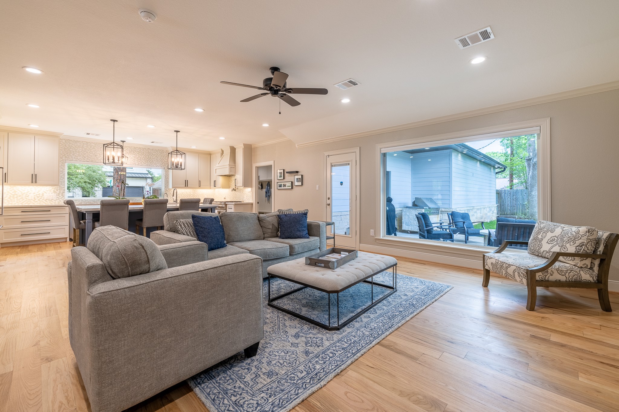 5230 Redstart Street Houston, TX 77035 - Photo 4 of 30 Bright and open living room with soaring 9-foot ceilings and luxury hardwood floors throughout