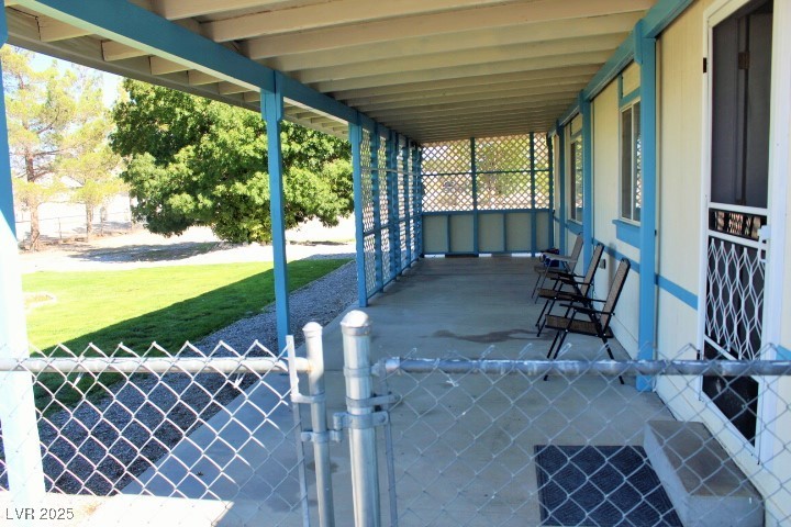 3891 South Rodeo Avenue Pahrump, NV 89048 - Photo 7 of 32 Full Length Covered patio & FRONT DOOR