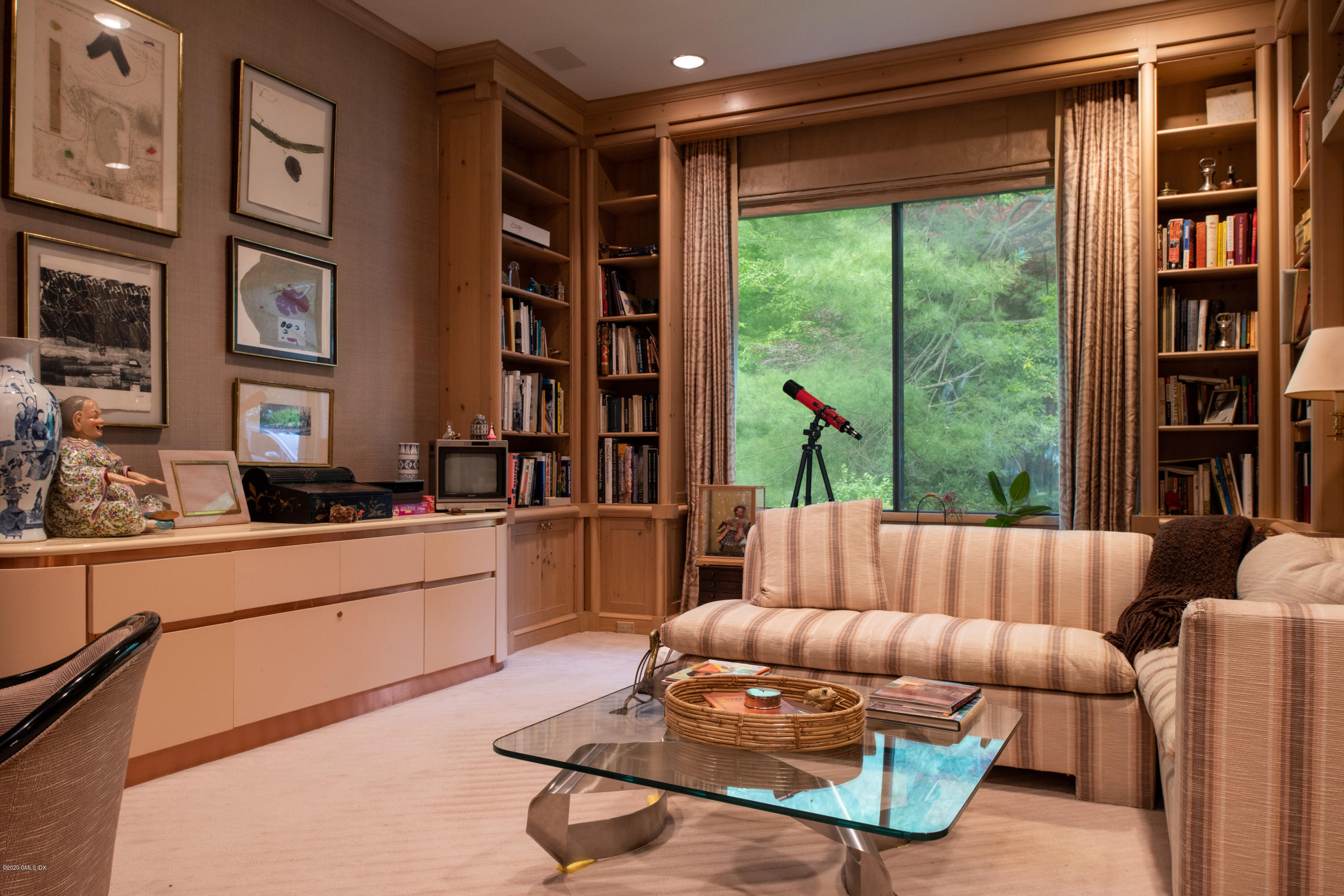 51-0 Burying Hill Road Greenwich, CT 06831 - Photo 16 of 47 a living room with furniture and a large window