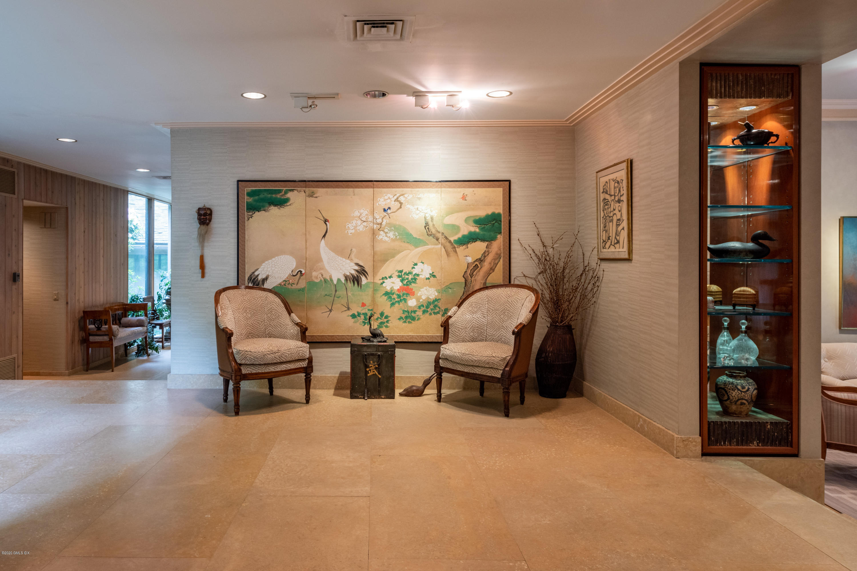 51-0 Burying Hill Road Greenwich, CT 06831 - Photo 7 of 47 a lobby with furniture and wooden floor