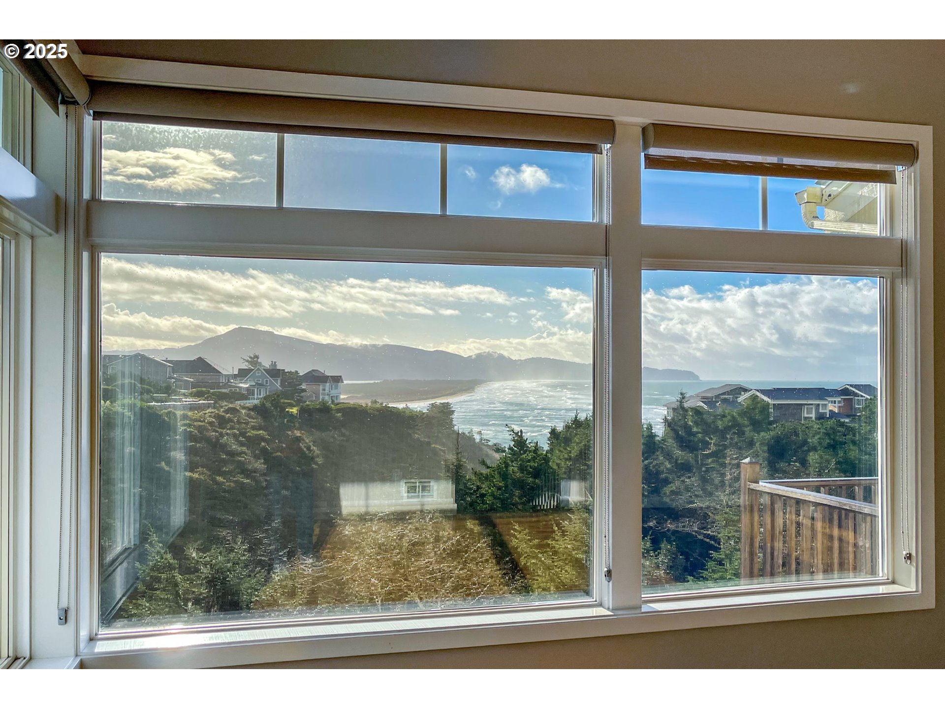 455 Capes Drive Oceanside, OR 97141 - Photo 2 of 48 a view of a living room and window