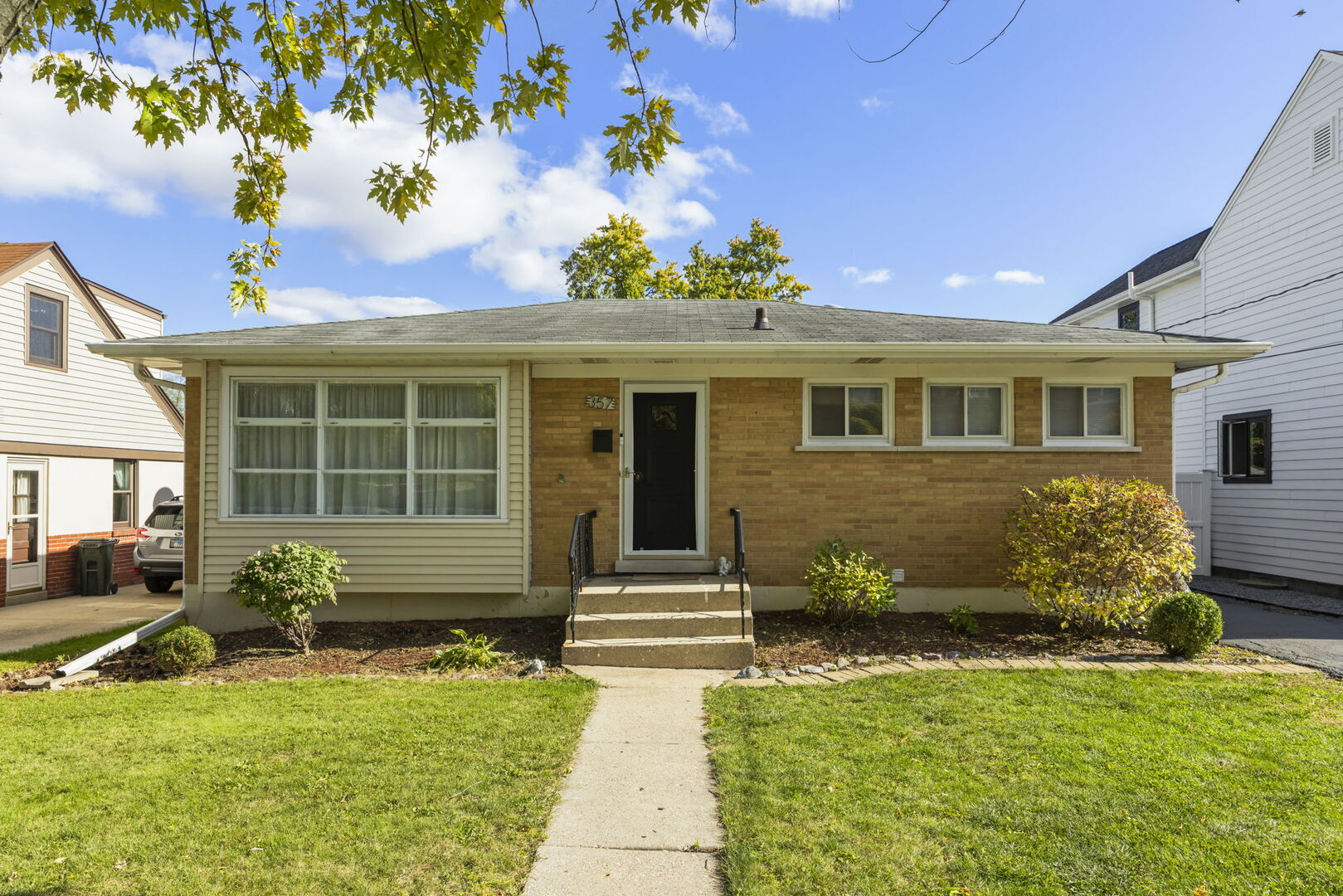 357 Bryant Avenue Glen Ellyn, IL 60137 - Photo 1 of 22 a front view of a house with a yard