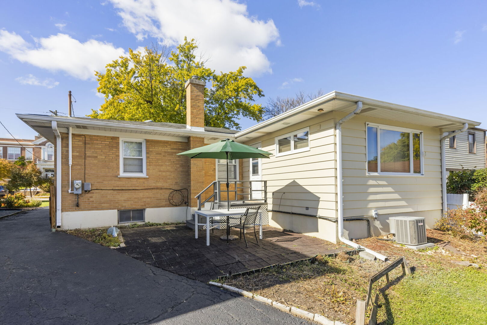 357 Bryant Avenue Glen Ellyn, IL 60137 - Photo 16 of 22 a front view of a house with garden