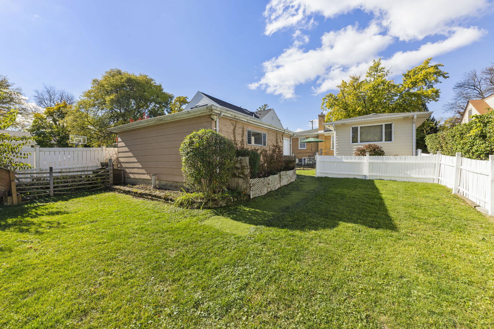 357 Bryant Avenue Glen Ellyn, IL 60137 - Photo 19 of 22 a view of a backyard with a garden and plants