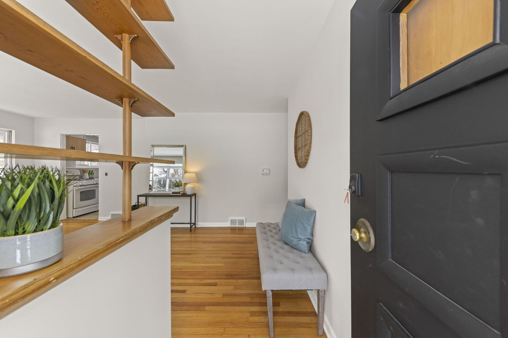 357 Bryant Avenue Glen Ellyn, IL 60137 - Photo 2 of 22 a view of living room kitchen and entryway