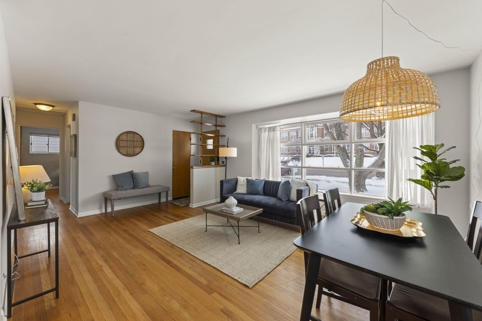 357 Bryant Avenue Glen Ellyn, IL 60137 - Photo 4 of 22 a living room with furniture a chandelier and a table