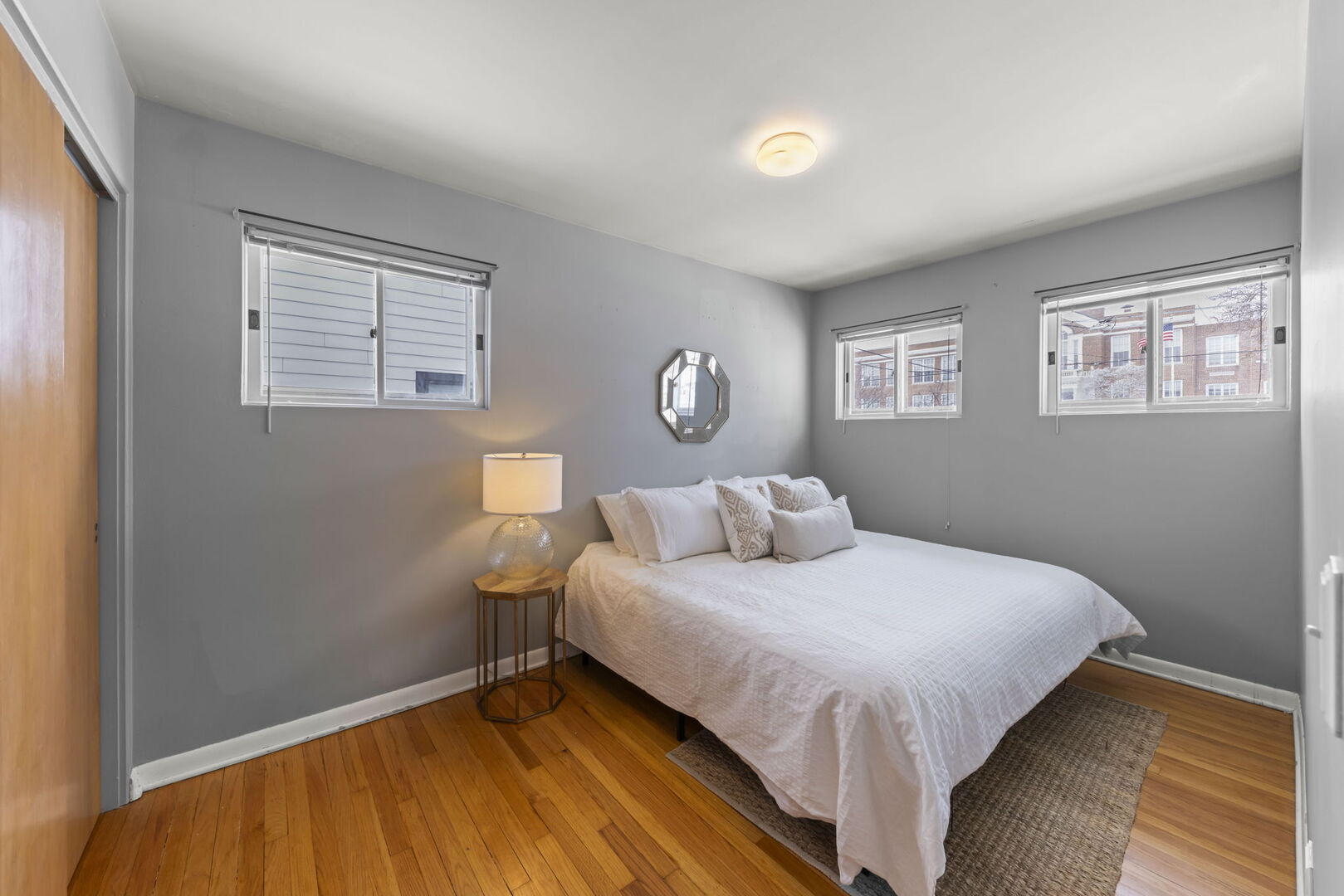 357 Bryant Avenue Glen Ellyn, IL 60137 - Photo 7 of 22 a bedroom with a bed and a window