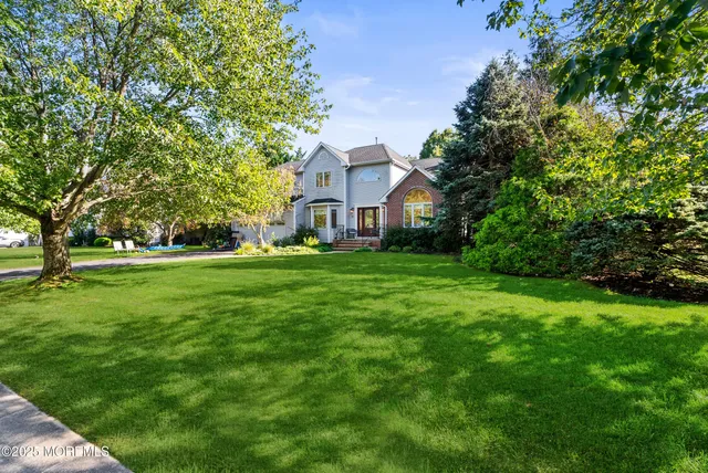 a view of a house with a big yard