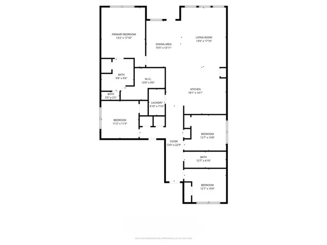 a view of a lake with a garden and wooden fence