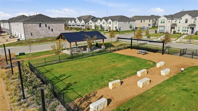 a view of a swimming pool with seating area