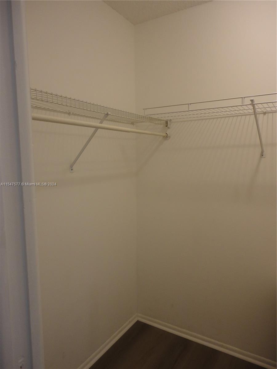 3321 Raleigh Street, Unit 3H Hollywood, FL 33021 - Photo 21 of 38 a view of small space with racks on the wall