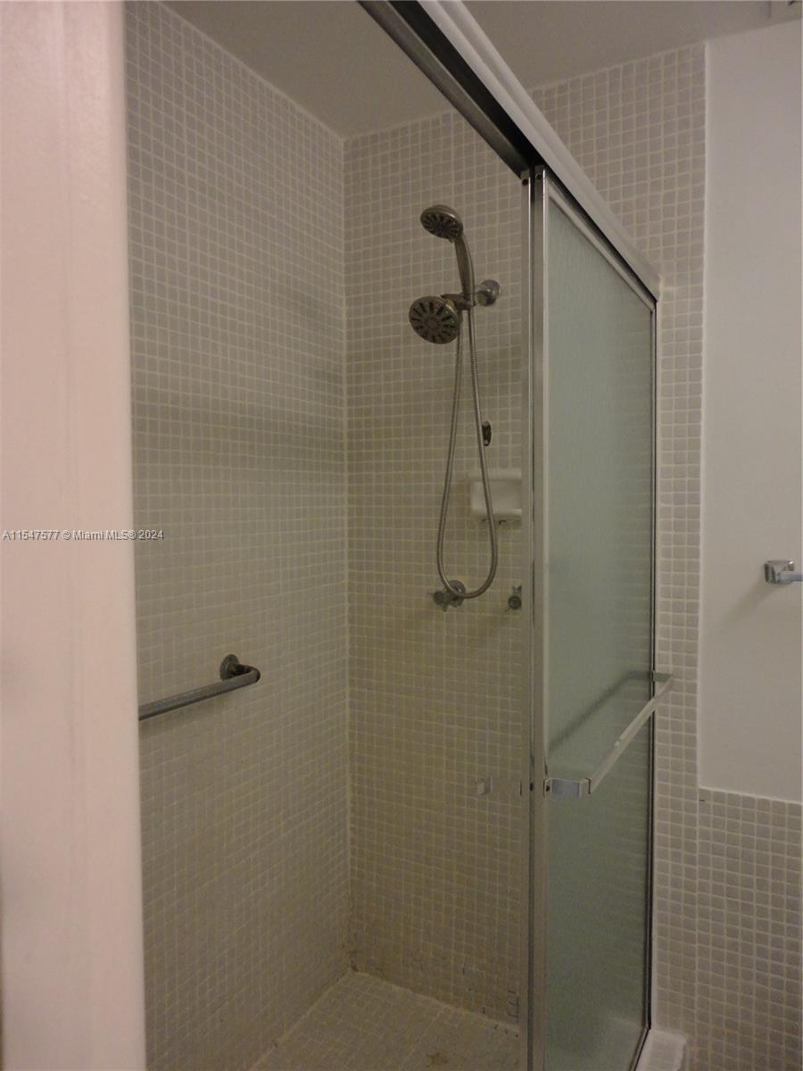 3321 Raleigh Street, Unit 3H Hollywood, FL 33021 - Photo 24 of 38 a bathroom with a shower