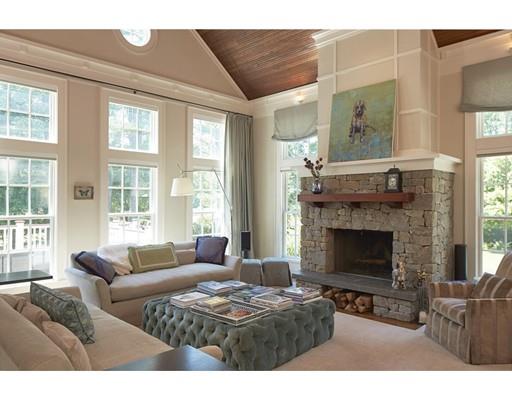 210 Meadowbrook Road Weston, MA 02493 - Photo 3 of 20 a living room with furniture and a fireplace