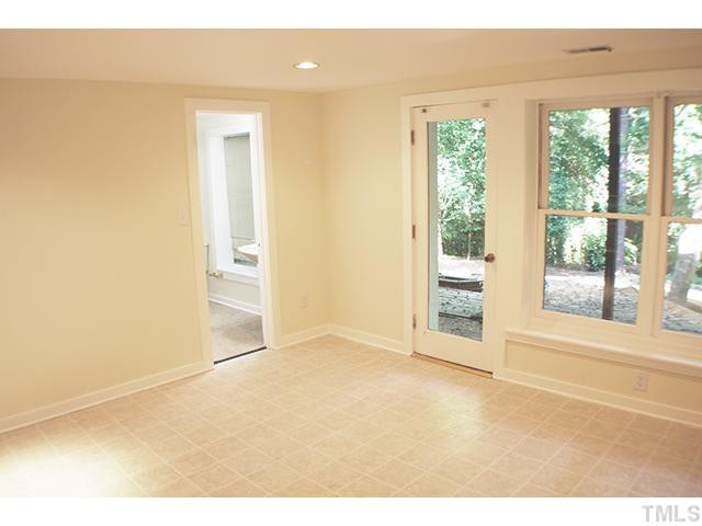 5212 Carter Street Raleigh, NC 27612 - Photo 12 of 19 Downstairs Common Area. or den if the downstairs is used as a mother-in-law suite.