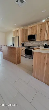 a view of a kitchen with a sink