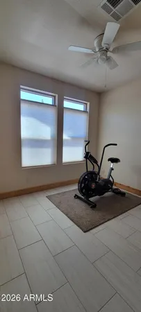 a view of a room with rack on the wall