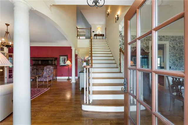 a kitchen with granite countertop a stove and cabinets