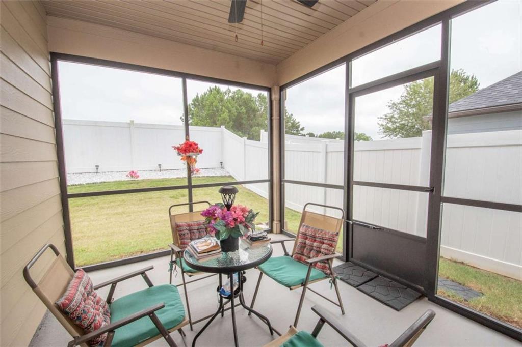 531 Carleton Place Locust Grove, GA 30248 - Photo 38 of 41 a view of a dining room with furniture window and outside view