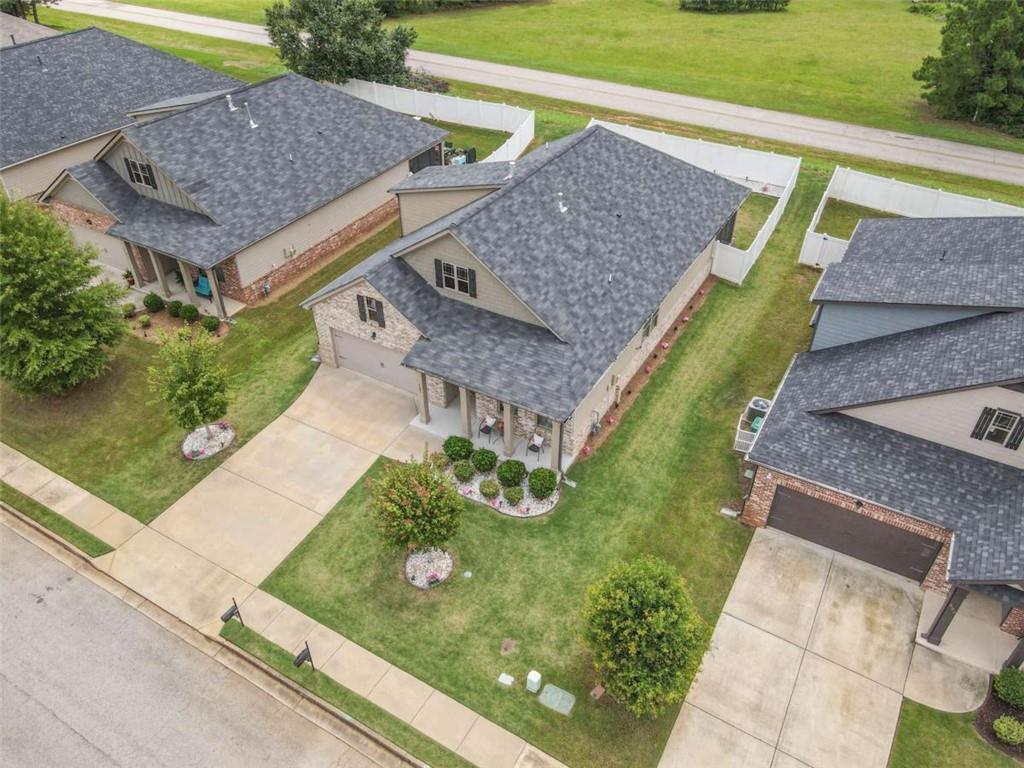 531 Carleton Place Locust Grove, GA 30248 - Photo 4 of 41 a aerial view of a house with a yard