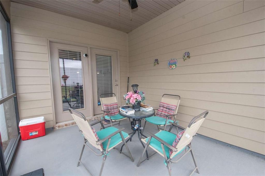 531 Carleton Place Locust Grove, GA 30248 - Photo 41 of 41 a dining room with furniture and a potted plant