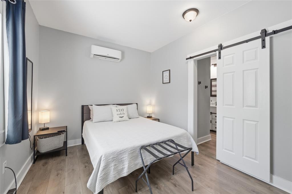 2320 Mistletoe Street Waco, TX 76706 - Photo 8 of 23 a bedroom with a bed and a table