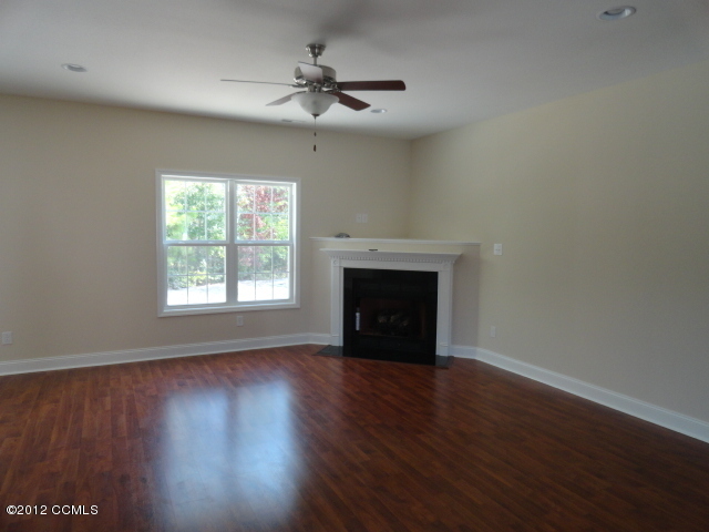 211 Sand Run Road Havelock, NC 28532 - Photo 32 of 44 Living room with corner fireplace