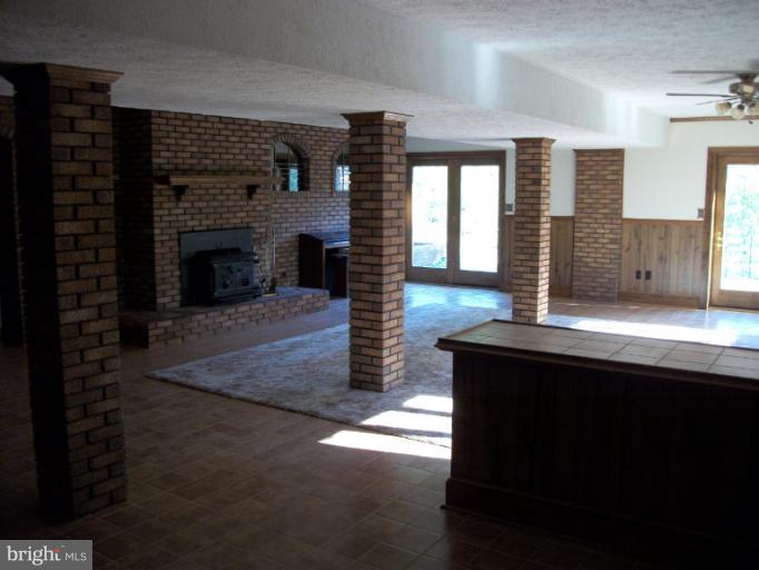 16002 Baden Naylor Road Brandywine, MD 20613 - Photo 14 of 15 Rec Room w/wood stove