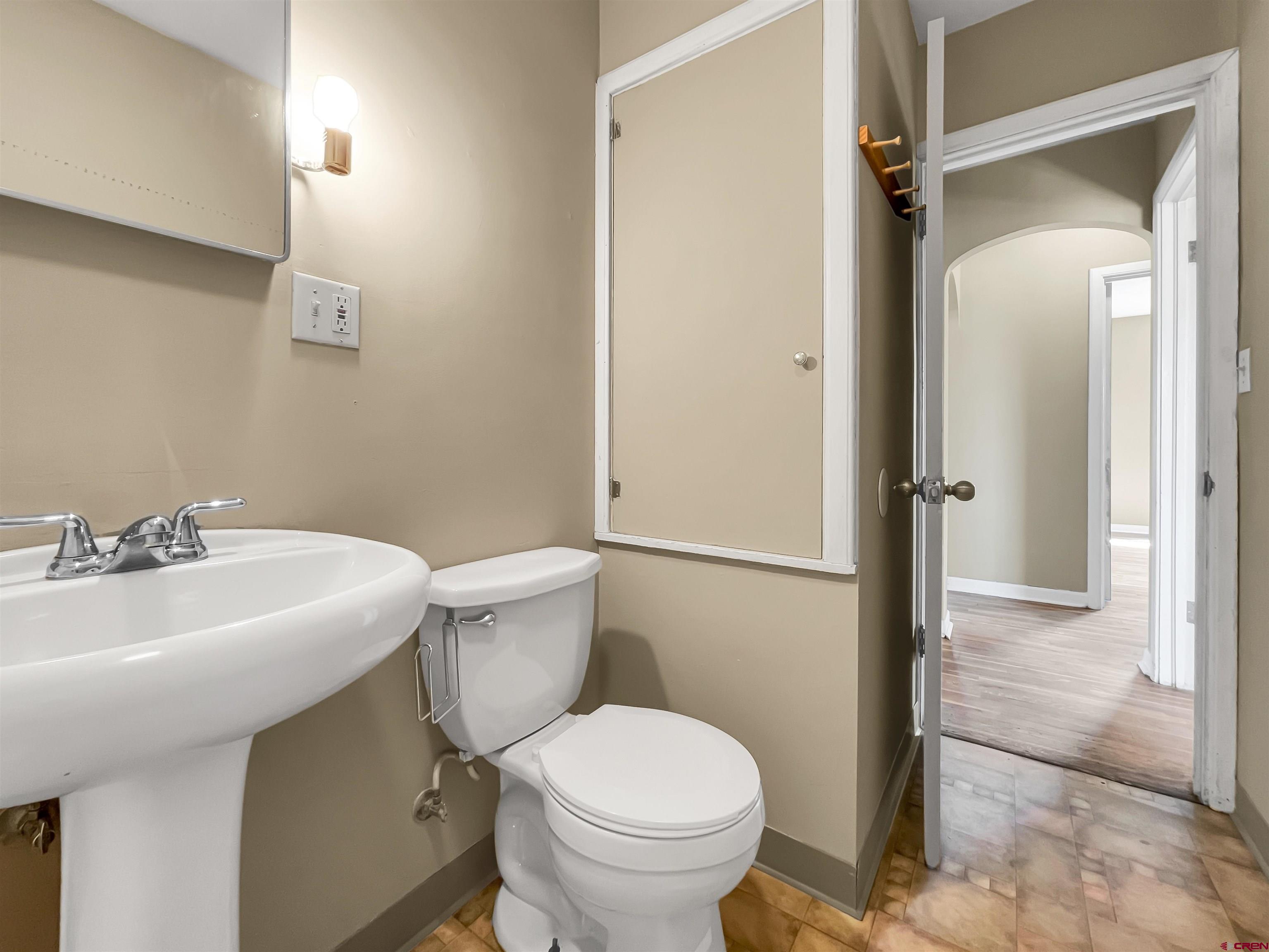 2001 Black Canyon Road Crawford, CO 81415 - Photo 24 of 45 a bathroom with a sink toilet and shower