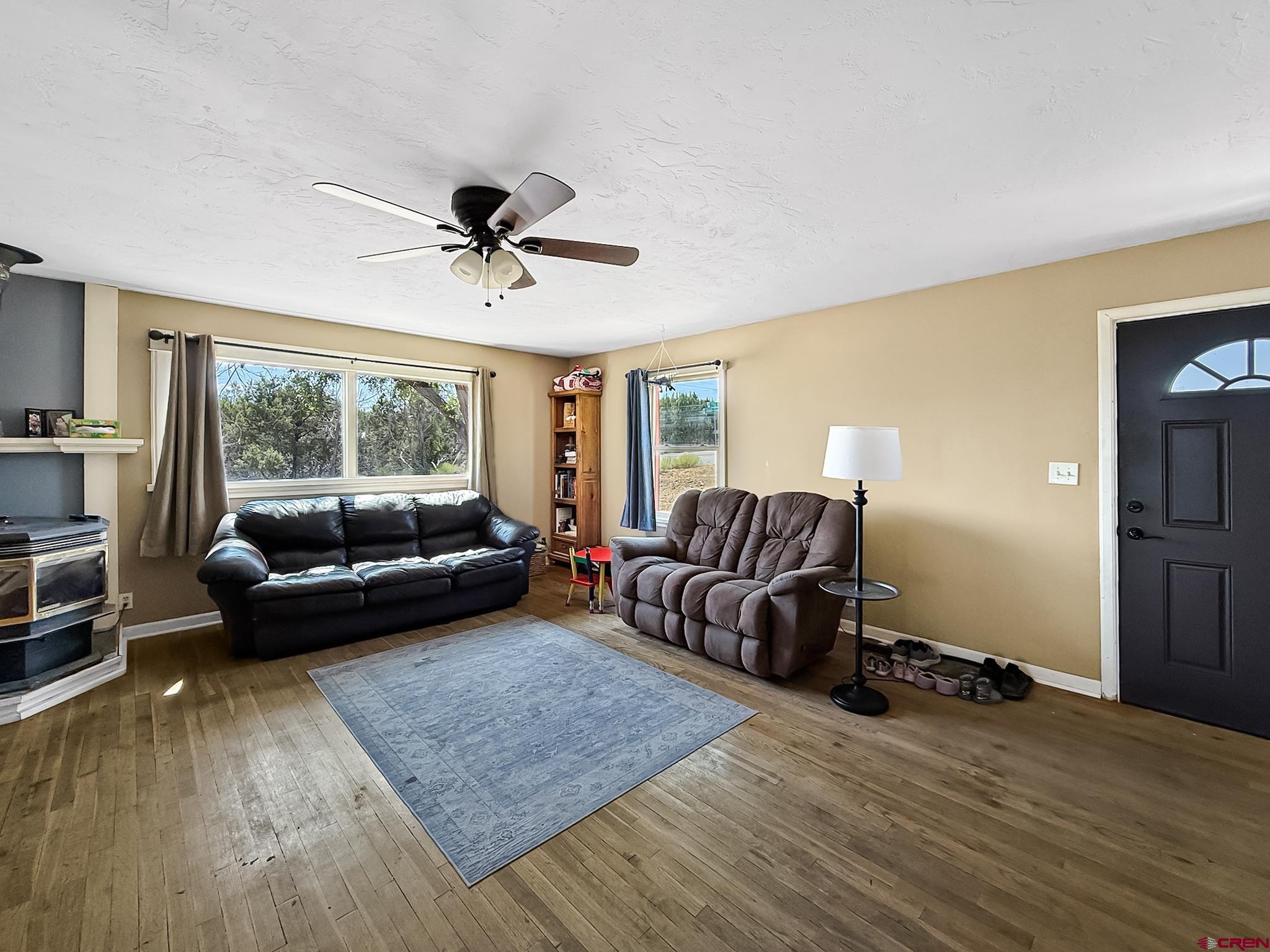 2001 Black Canyon Road Crawford, CO 81415 - Photo 7 of 45 a living room with furniture and a large window