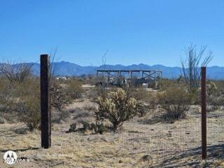 13950 Cameron Road, Unit 10 Yucca, AZ 86438 - Photo 1 of 4 a view of a lake with a mountain in the background