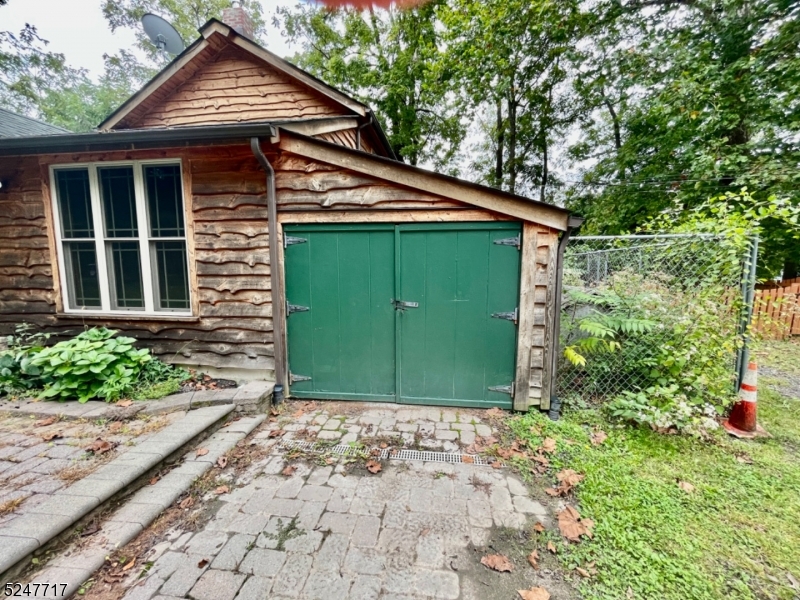 35 Stillwater Road Blairstown, NJ 07825 - Photo 12 of 13 a front view of a house with garden