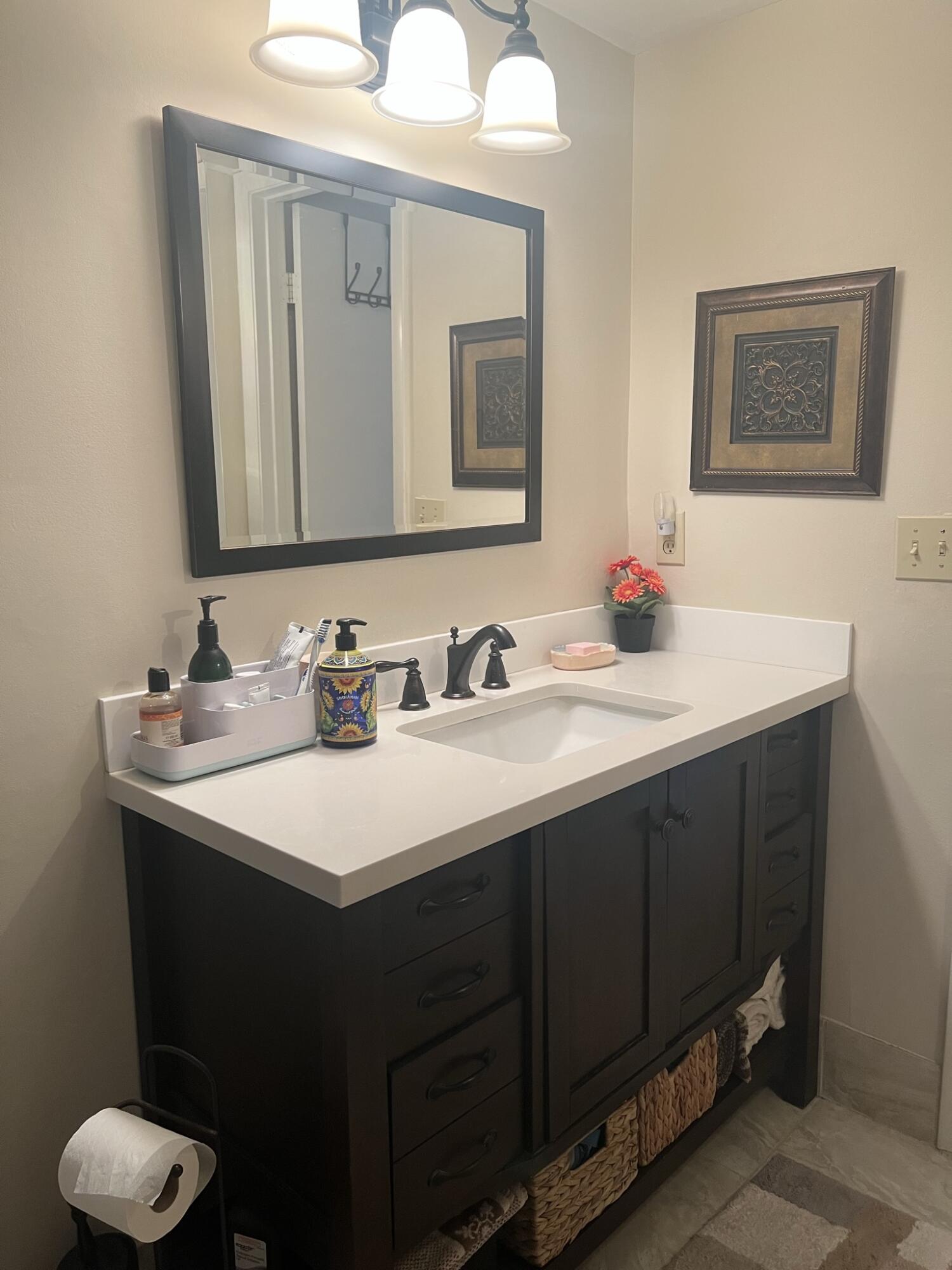 1605 Highway 1, Unit 201M2 Jupiter, FL 33477 - Photo 14 of 47 a bathroom with a double vanity sink and a mirror
