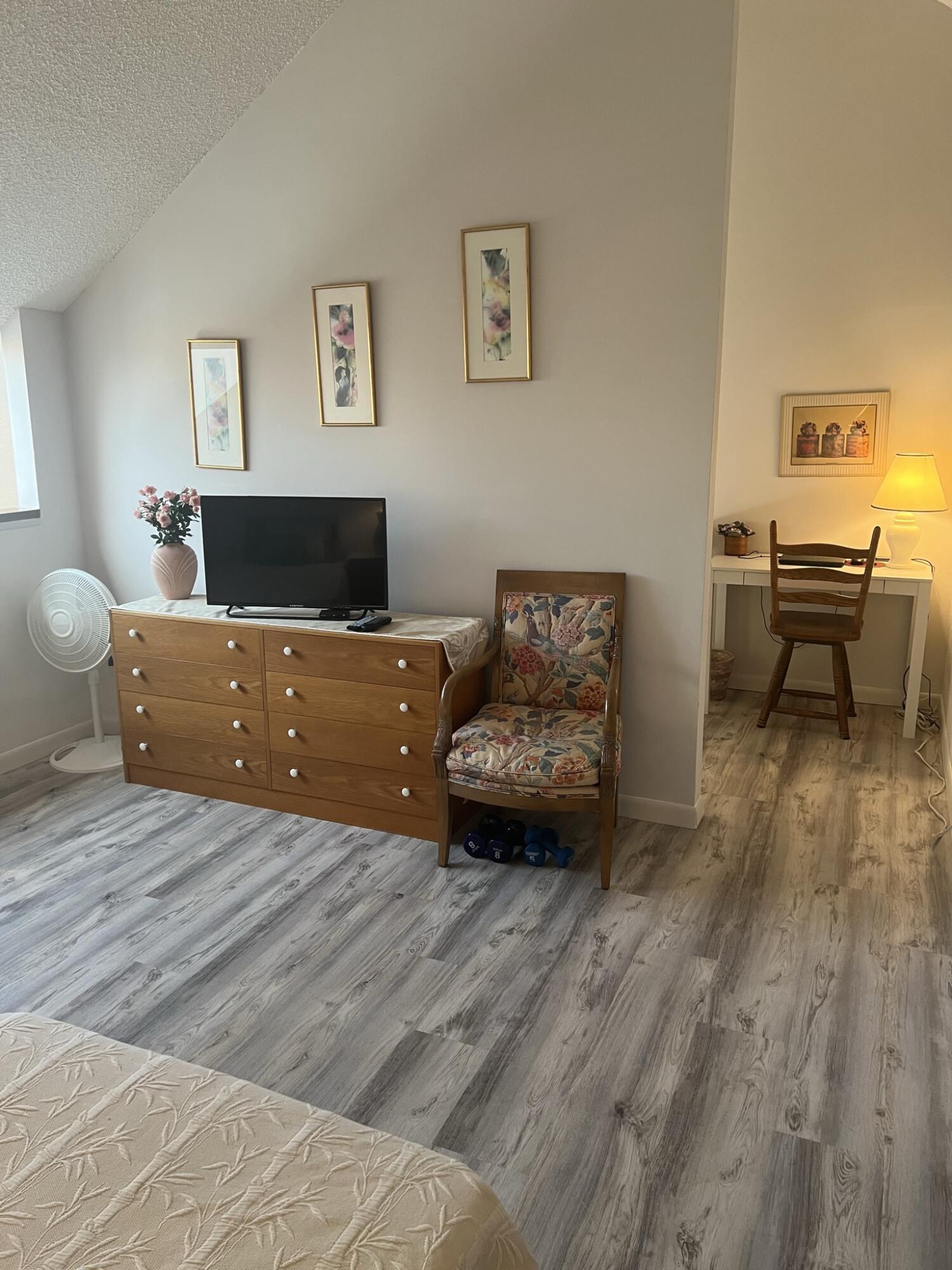 1605 Highway 1, Unit 201M2 Jupiter, FL 33477 - Photo 23 of 47 a bedroom with furniture and window