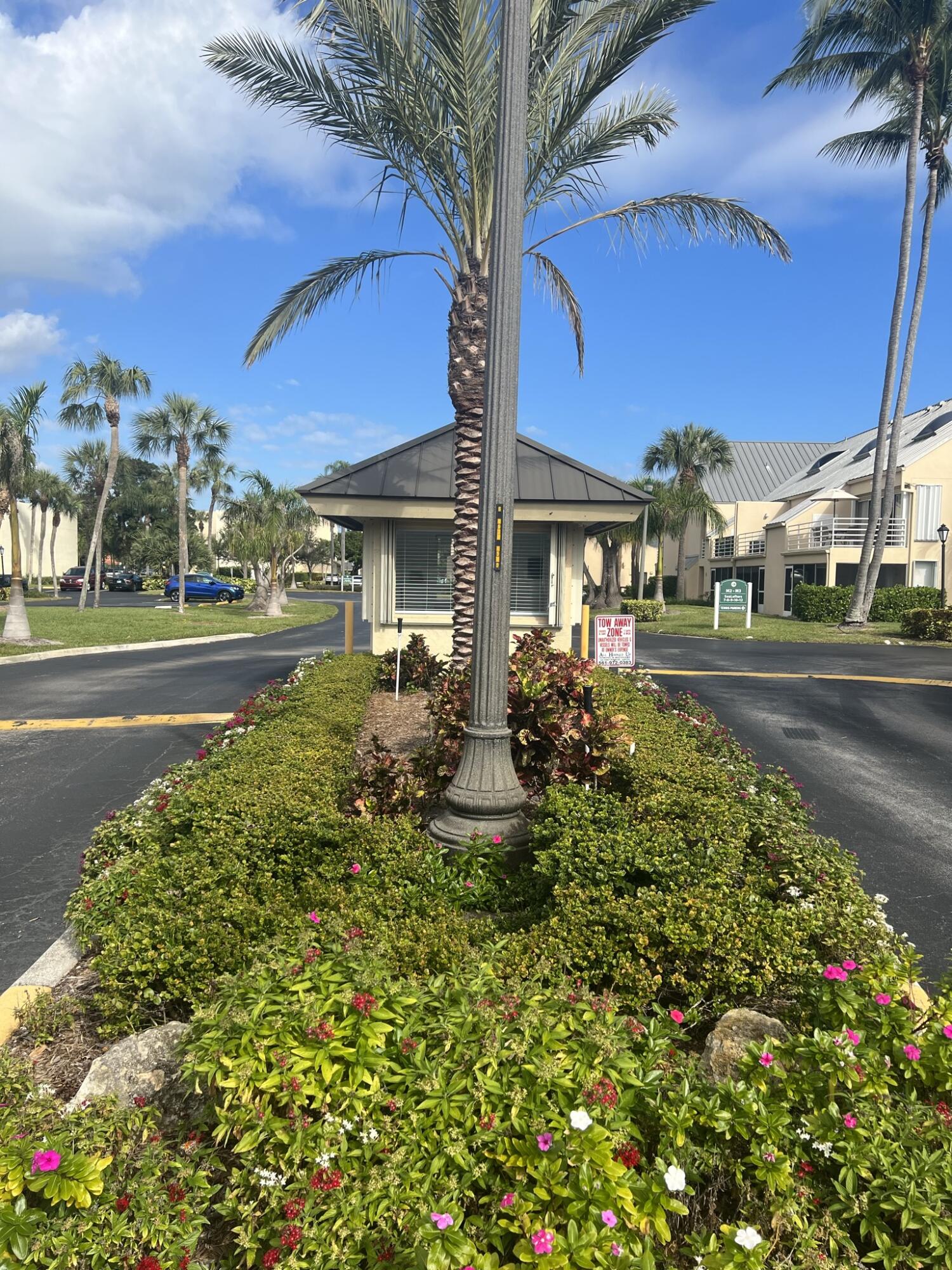 1605 Highway 1, Unit 201M2 Jupiter, FL 33477 - Photo 38 of 47 a front view of a house with garden