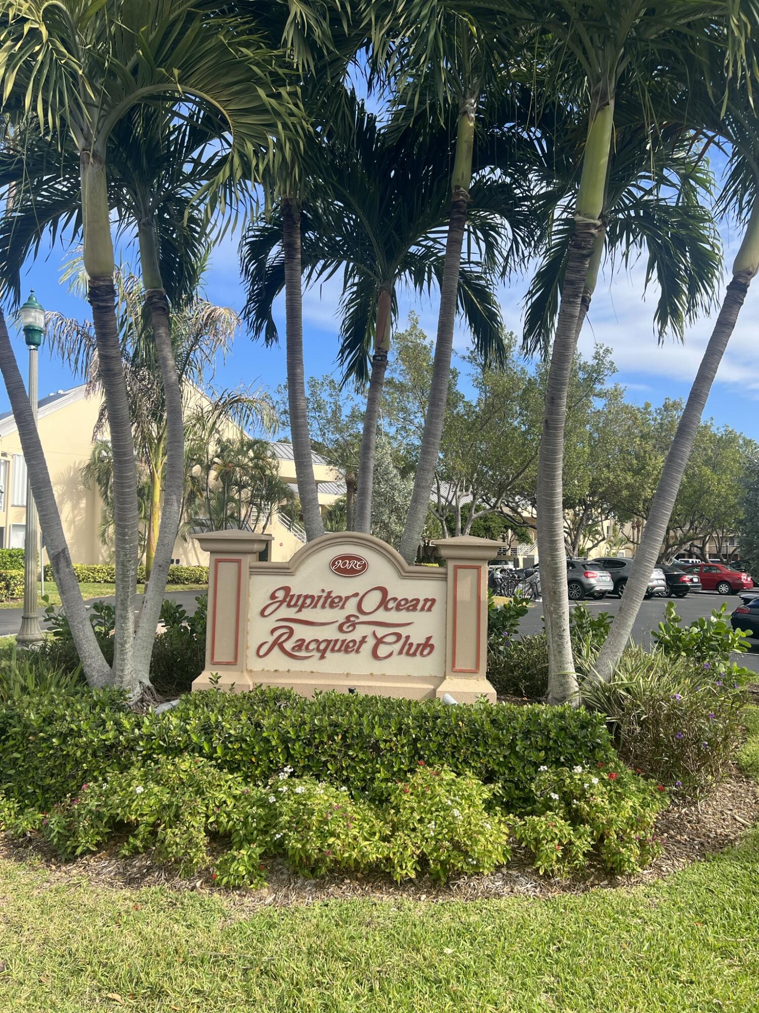 1605 Highway 1, Unit 201M2 Jupiter, FL 33477 - Photo 40 of 47 a sign on the side of the road