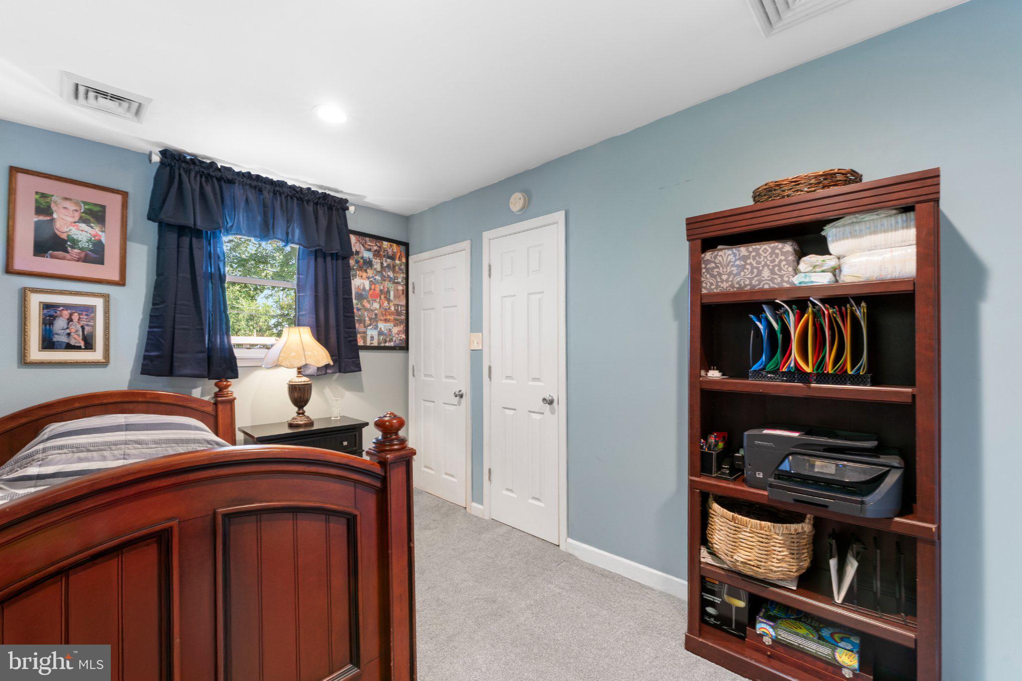 1748 Larkin Road Upper Chichester, PA 19061 - Photo 31 of 32 a bedroom with a bed and a closet